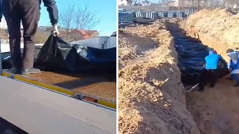 بالفيديو .. دفن 67 أوكرانيا في مقبرة جماعية