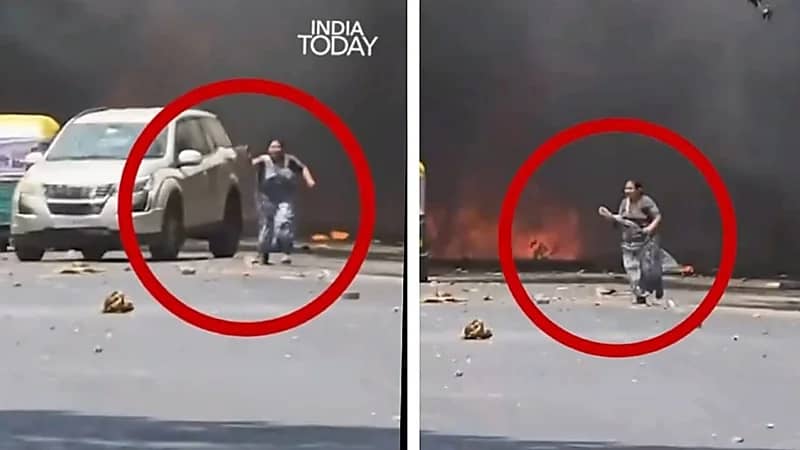 أم هندية تفشل في إنقاذ طفلها من نيران الطائرة المنكوبة .. فيديو