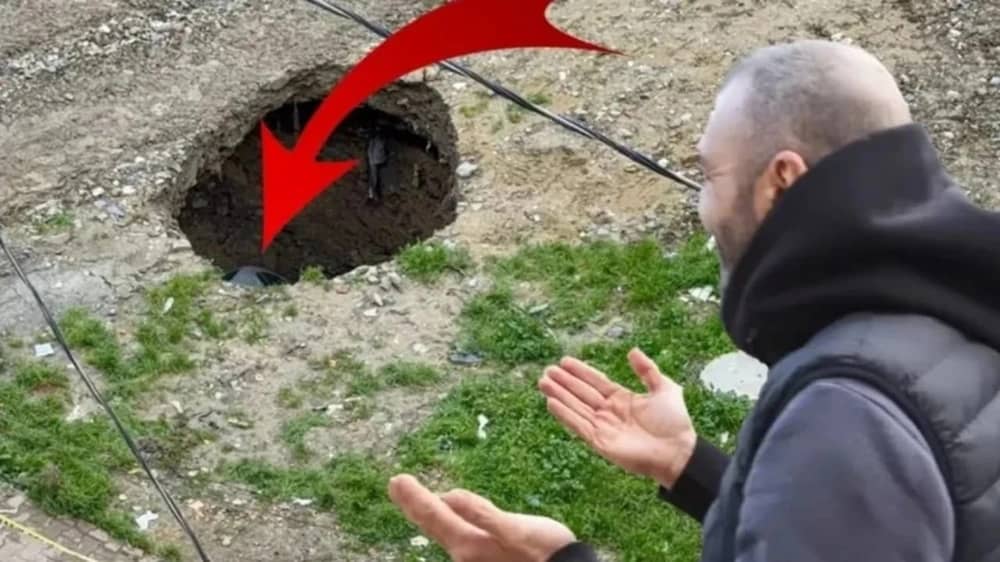 رد فعل غريب لمالك سيارة فاخرة ابتلعها انهيار أرضي مفاجئ.. فيديو