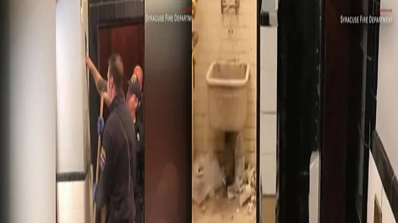 العثور على رجل عارٍ داخل جدار