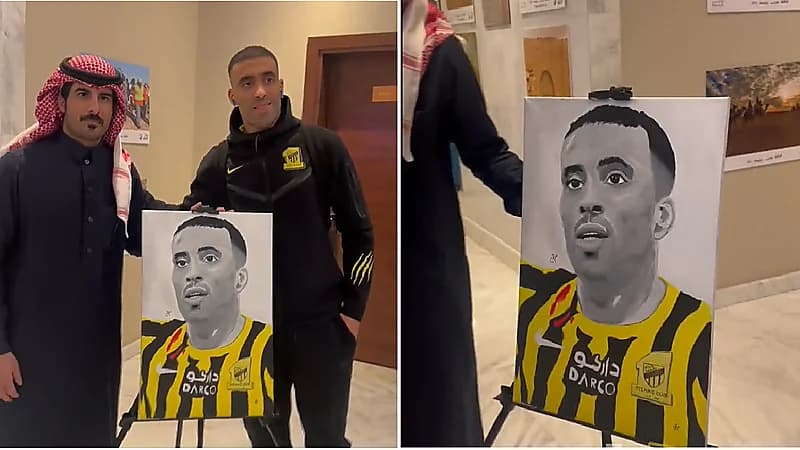 بالفيديو.. مشجع اتحادي يهدي "حمدالله" رسمة لحظة وصوله حائل