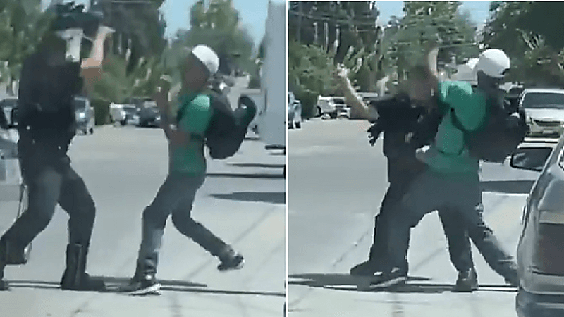 شاهد.. رجل شرطة يدخل في نزال ملاكمة مع متهم