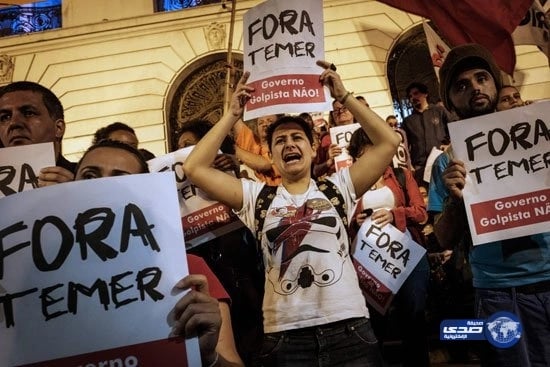 بالصور : اشتباكات بين الشرطة البرازيلية ومحتجين على عزل روسيف