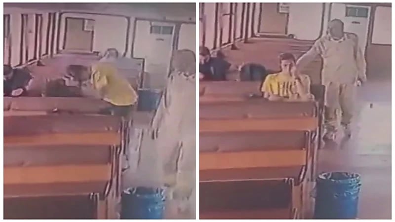 تركي يحرق شعر شاب بسبب طوله .. فيديو