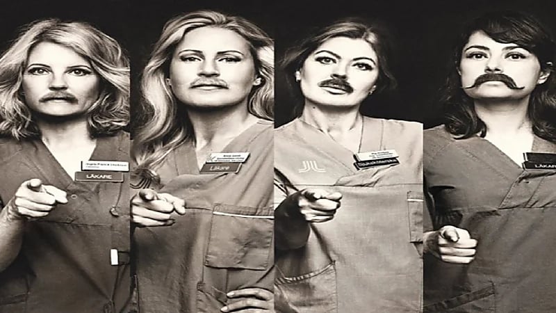 نساء يضعن شوارب مستعارة للاحتفاء باليوم العالمي للرجل