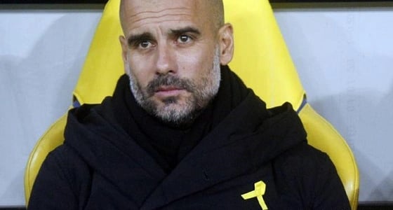 " غوارديولا " يتمسك بشارته الصفراء مدافعًا عنها