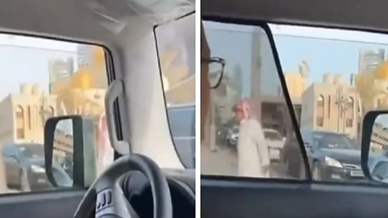 شاهد.. مواطن ينظم حركة السير في سوق المباركية بعد تزاحم السيارات بسبب الحريق الهائل