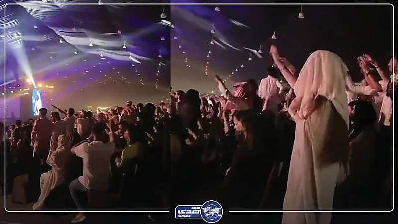 فتاة كهربائية تدخل في حالة رقص هستيري في المدرجات