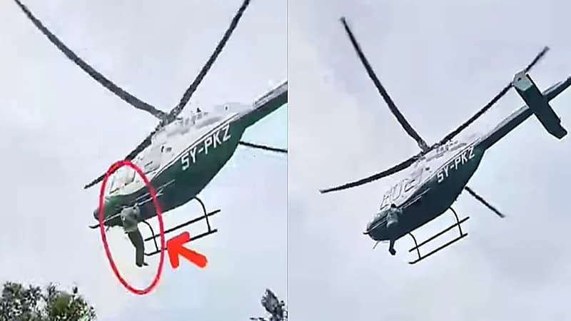 شاب يتمسك بطائرة هليكوبتر لحظة إقلاعها في حفل زفاف.. فيديو